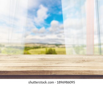 Kitchen Wooden Table On Blur Window Background