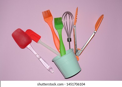 kitchenware on a pink background