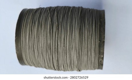 kite string spools neatly arranged and ready for use, representing an essential accessory for traditional kite flying, outdoor recreation, and family leisure activities.