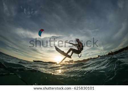 Kite surf ride his hydrofoilkite