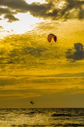 A Kite Surfer Goes Airborne On Lake Michigan At Grand Haven, Michigan