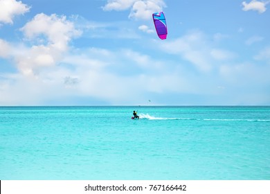 Kite Surfing At Aruba Island In The Caribbean Sea