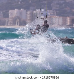 Kite surfing, Kite boarding action photo in Spanish Costa Brava