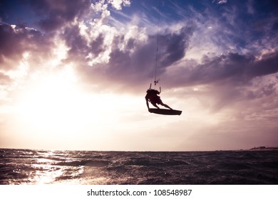 Kite Surfing At Sunset.