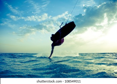 Kite Surfing At Sunset.