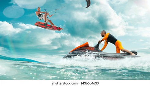 Kite Surfing And Water Scooter In Tropical Ocean.