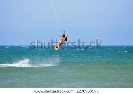 Kite Surfing water sports in Al Uzaiba beach in Muscat city in Sultanate of Oman 