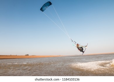 Kiteboarders riding the waves at Shingle Street, Suffolk