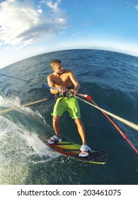 Kiteboarding, Fun In The Ocean, Extreme Sport. Action Camera POV Angle With Motion Blur.