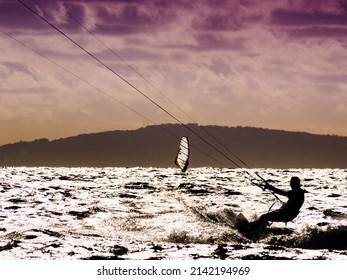 Kiteboarding. kite surfer rides the waves, Tarifa Spain. Sports activity. Kitesurfing action.