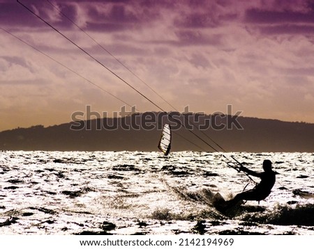 Kiteboarding. kite surfer rides the waves, Tarifa Spain. Sports activity. Kitesurfing action. Foto stock © 
