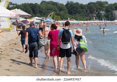 Kiten, Burgas Province, Bulgaria. 30.07.2021. Holidaymakers, on the Black Sea coast. People sunbathe on the beach and swim in the sea.