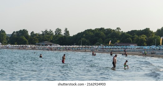 Kiten, Burgas Province, Bulgaria. 31.07.2021. Holidaymakers, on the Black Sea coast. People sunbathe on the beach and swim in the sea.