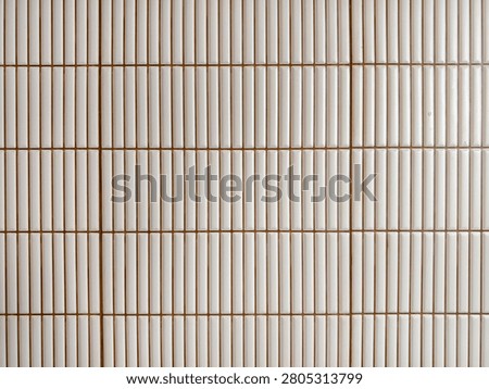 KitKat ceramic mosaic wall tile featuring a sleek white glossy finish, designed in modern fluted pattern