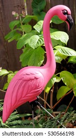 Kitsch Pink Flamingo Lawn Ornament. Vertical.
