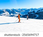 Kitzbuhel in Kitzbühel Alps region Tyrol, Austria - Skier on ski slope in ski resort in Austrian Alps