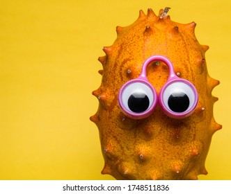 Kiwano (Horned Melon) with googly eyes - Shutterstock ID 1748511836