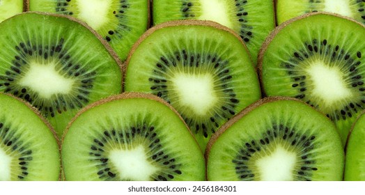  Kiwi fruit slices. Fresh kiwi total background