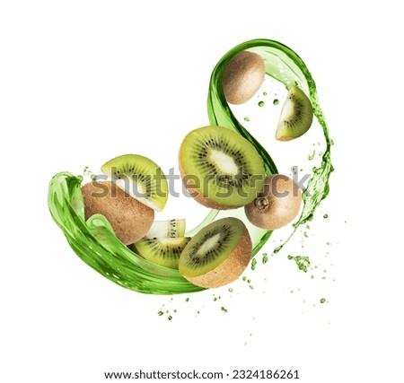 Kiwi fruit in splashes of juice isolated on a white background