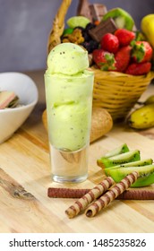 Kiwi Ice Cream Scoops In Tall Dessert Glass. 