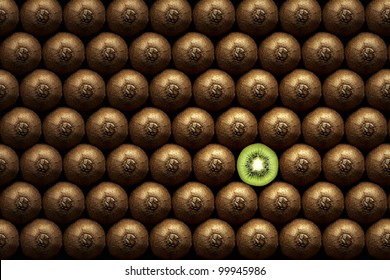 Kiwi slice amongst many whole kiwi's - Powered by Shutterstock