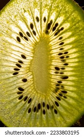 Kiwi slice macro shot. Creative macro food background - Shutterstock ID 2233803195