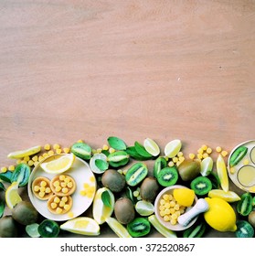 Kiwis And Lemons, The Lemon Detox Water And Sugar On Wooden Background With Space For Text