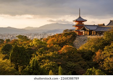 Kiyomizu-dera temple in Kyoto, Japan, in beautiful autumn colors, evening light and view of the city - Shutterstock ID 2268388789