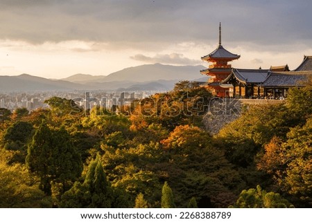 Kiyomizu-dera temple in Kyoto, Japan, in beautiful autumn colors, evening light and view of the city