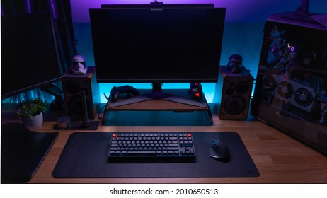 KL, MALAYSIA - July 20th, 2021 :  A Work From Home Office Setup. HTPC, Hackintosh PC  Gaming PC Rig With Liquid Cooling Setup And Full RGB Light Inside 