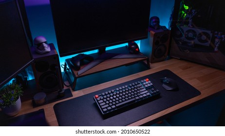 KL, MALAYSIA - July 20th, 2021 :  A Work From Home Office Setup. HTPC, Hackintosh PC  Gaming PC Rig With Liquid Cooling Setup And Full RGB Light Inside 