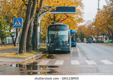KLAIPEDA, LITHUANIA - OCTOBER 25, 2020: Charging electric bus in Klaipeda bus station. Dancer is a brand owned and developed by company group Vejo projektai