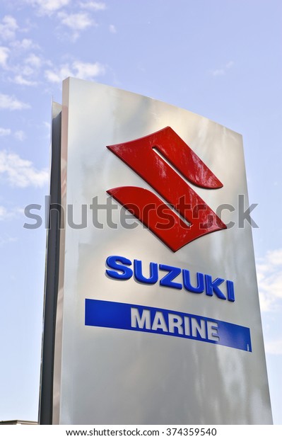 KLAIPEDA,LITHUANIA-JULY\
08:Suzuki dealership sign against blue sky on July 08,2015 in\
Klaipeda,Lithuania. Suzuki Motor Corporation is a Japanese\
multinational\
corporation.