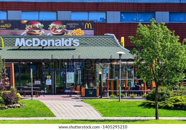 Klaipeda,Lithuania-May 20,2019:McDonald\'s Restaurants\
and logo.The McDonald\'s Corporation is the world\'s largest chain of\
hamburger fast food restaurants.\
