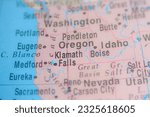 Klamath Falls on political map of globe, travel concept, selective focus, background