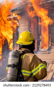 Klamath Falls, Oregon USA 12-8-2020: Firefighters Conduct Structural Fire Training On A Burn To Learn Scenario.