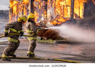 Klamath Falls, Oregon USA 12-8-2020: Firefighters Conduct Structural Fire Training On A Burn To Learn Scenario.