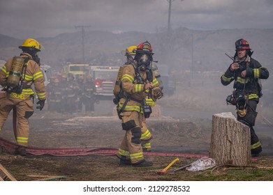 Klamath Falls, Oregon USA 12-8-2020: Firefighters Conduct Structural Fire Training On A Burn To Learn Scenario.