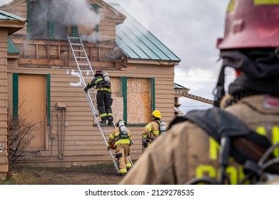 Klamath Falls, Oregon USA 12-8-2020: Firefighters Conduct Structural Fire Training On A Burn To Learn Scenario.