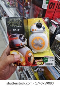 Klang, Malaysia - 22 May 2020 : Hand hold a packed of Sphero's BB-8 Star Wars toy for sell in the supermarket with selective focus. 

