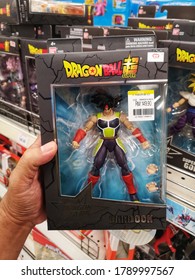 Klang, Malaysia - 30 July 2020 : Hand Hold A Boxed Of Dragon Ball Super Bardock Toy Character For Sale In Supermarket Store With Selective Focus.  