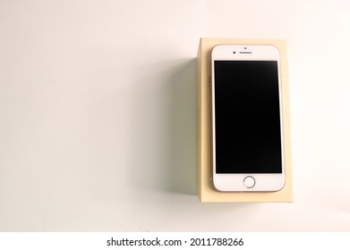 Klang, Malaysia: July 20, 2021- New iphone 8 and box isolated on white background
