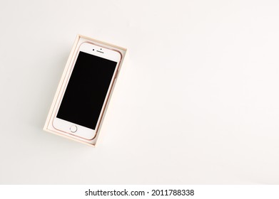 Klang, Malaysia: July 20, 2021- New apple iphone 8 in box isolated on white background
