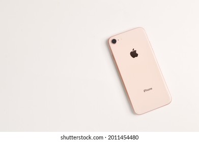 Klang, Malaysia: July 20, 2021-New iphone 8 gold color by Apple isolated on white background