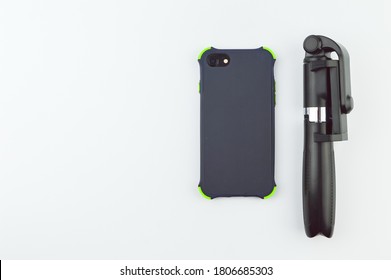 Klang,Malaysia: 1st September 2020- Mini Tripod And Smartphone Isolated On A White Background.