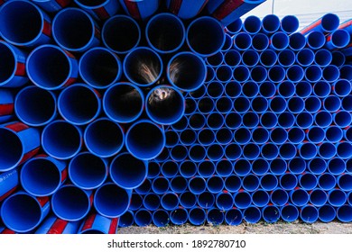 Klaten, Indonesia - December 12, 2020 : Close Up To Blue Pipe Background, PVC Pipes Stacked In Warehouse, PVC Water Pipes Used For Construction