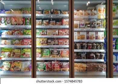 KLIA2, MALAYSIA - 24 OCT 2019: Interior View Of Huge Glass Freezer With Various Brand Local And Imported Frozen Food In Jaya Grocery Store.   