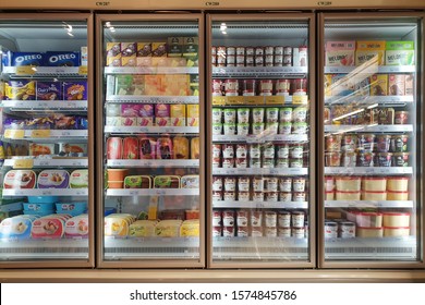 KLIA2, MALAYSIA - 24 OCT 2019: Interior View Of Huge Glass Freezer With Various Brand Local And Imported Frozen Food In Jaya Grocery Store.   