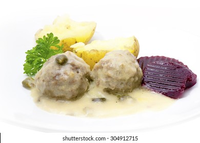 KÃ¶nigsberger Klops, Meatballs In A White Sauce With Capers, Potatoes And Beetroot On A Plate, A Specialty Of The Prussian City Of Koenigsberg, Now Kaliningrad