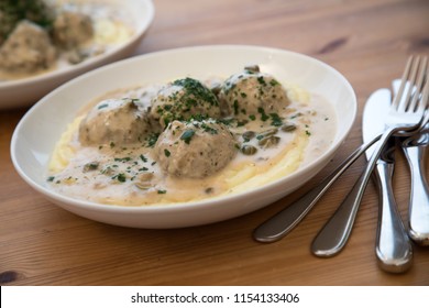 Königsberger Klopse Meatballs With Caper Sauce, Mashed Potatoes And Parsley Is A Traditional And Typical German Dish